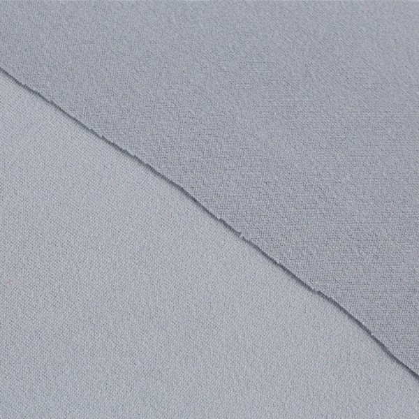 Solid double brushed polyester fabric